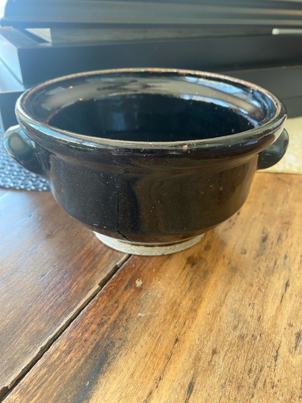 Signed studio pot black glazed 6” round with cup handles